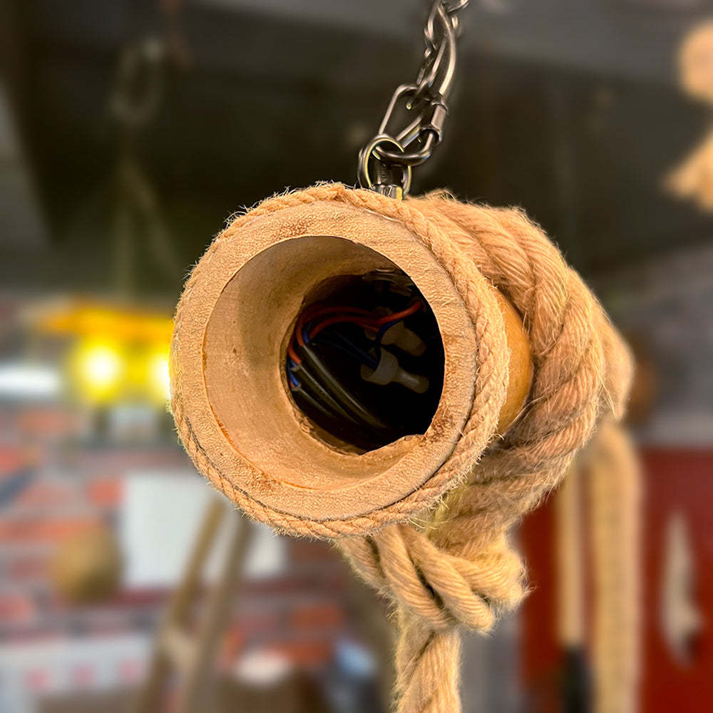 Alessio pendant light socket detail. Hemp rope & wood lighting fixture.