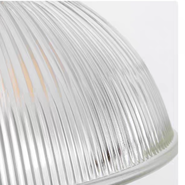 Alessio glass pendant light. Ribbed bowl shade for dining room lighting.