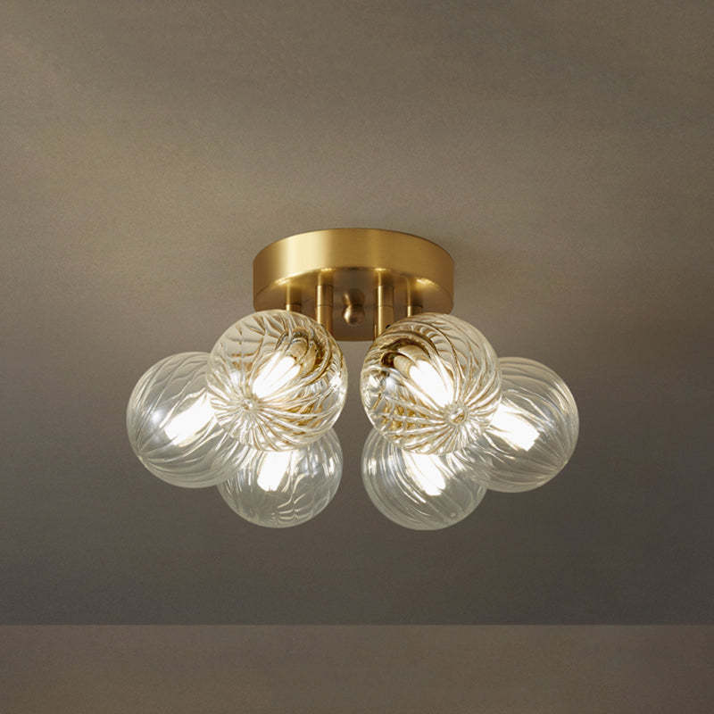 Modern brass and glass bubble ceiling light fixture