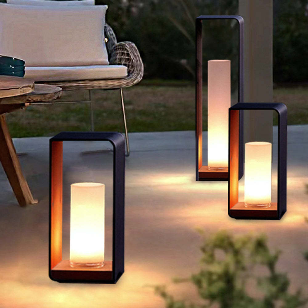 Orr minimalist outdoor floor lamps illuminate a patio. Orr Minimalist Cuboid Candle Outdoor Floor Lamp Garden