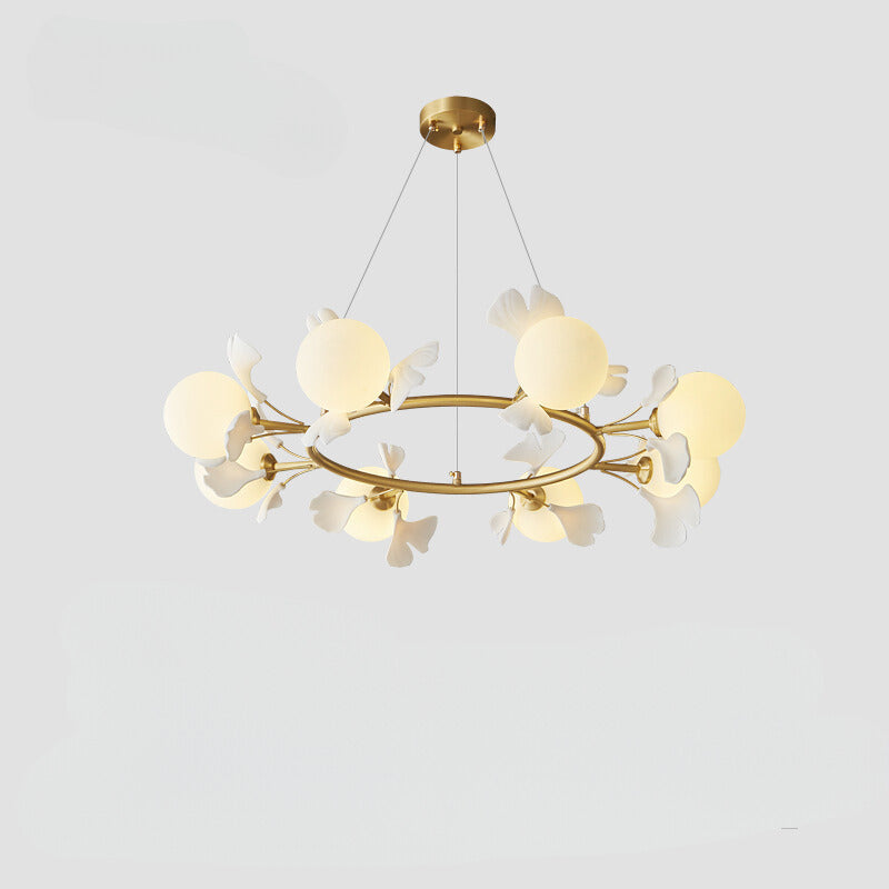 Olivia Chandelier gold ring and leaf design