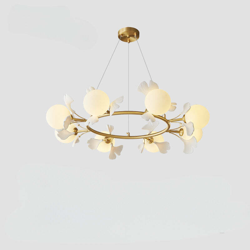 Olivia Chandelier gold ring and leaf design