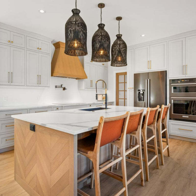 Muto Birdcage pendant lights above kitchen island