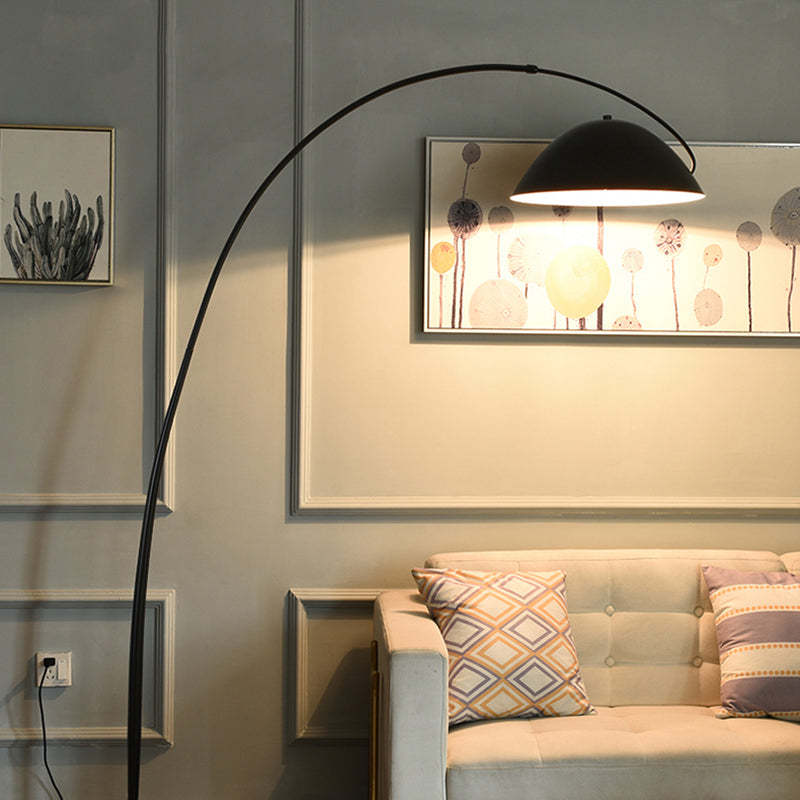 Avi Modern Floor Lamp by Las Sola over sofa with art