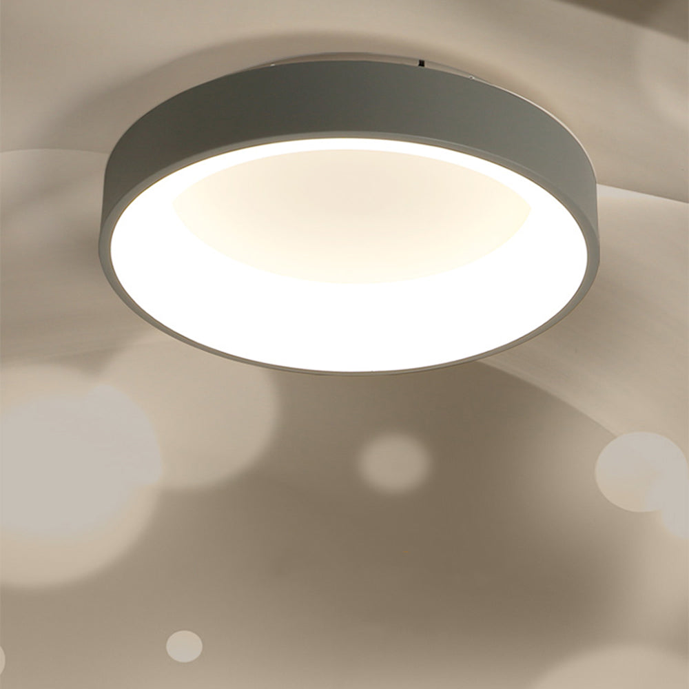 Quinn Modern Flush Mount Ceiling Light illuminating a room