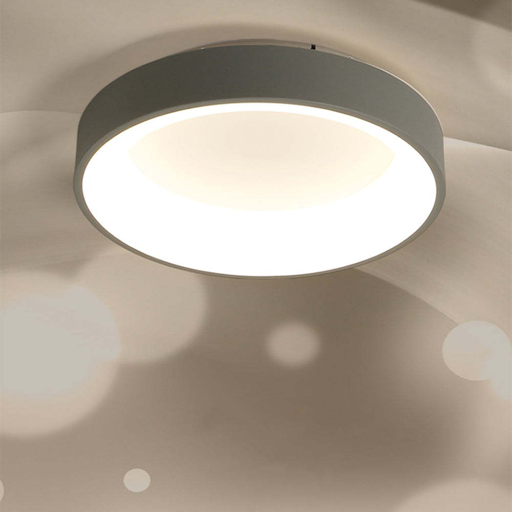 Quinn Modern Flush Mount Ceiling Light illuminating a room