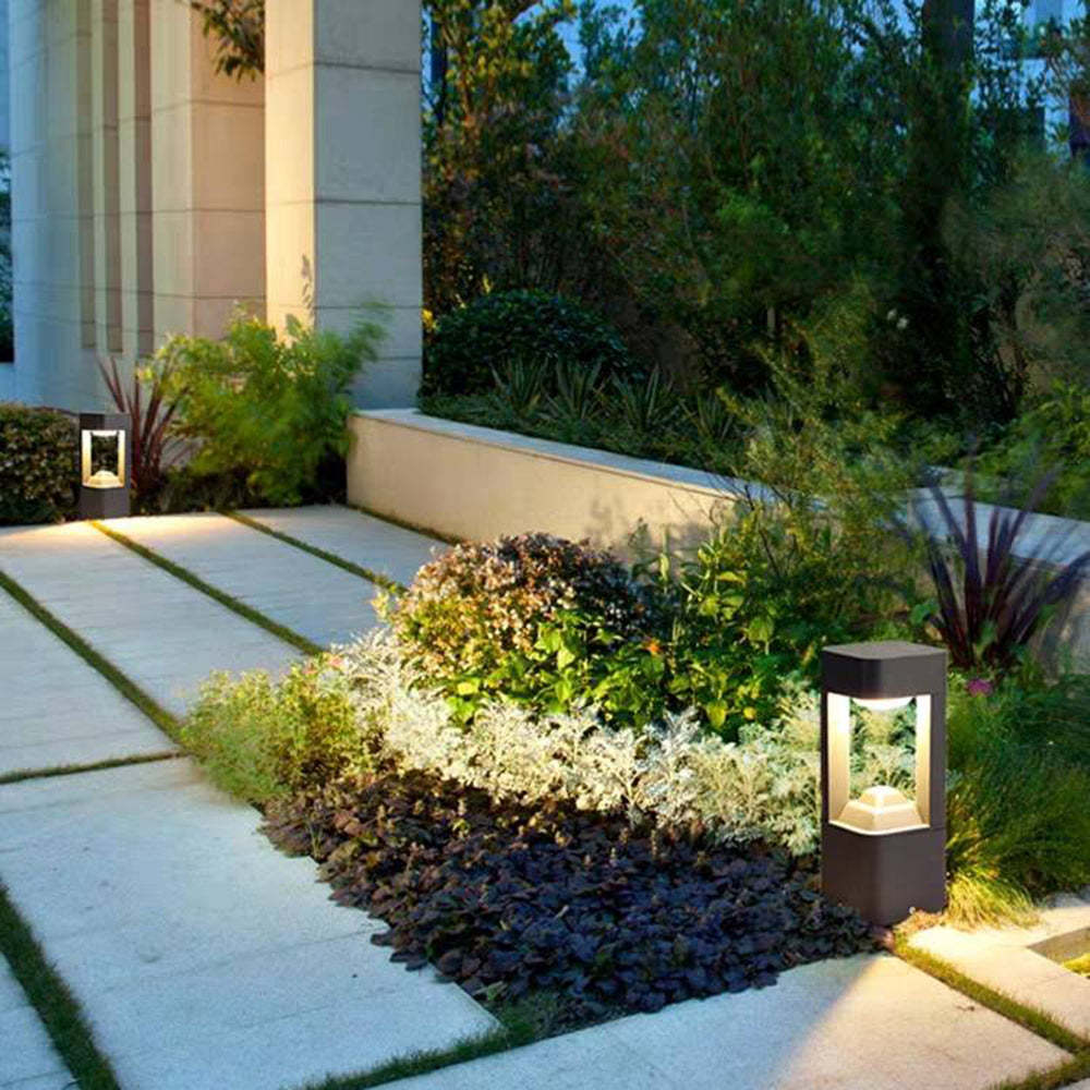 Pena Outdoor Path Light illuminating garden