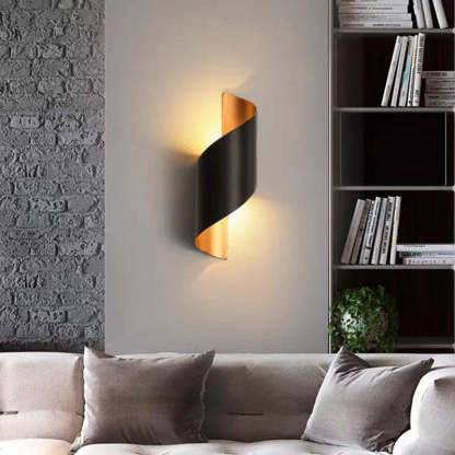 Orr modern black and gold wall lamp in living room by Las Sola