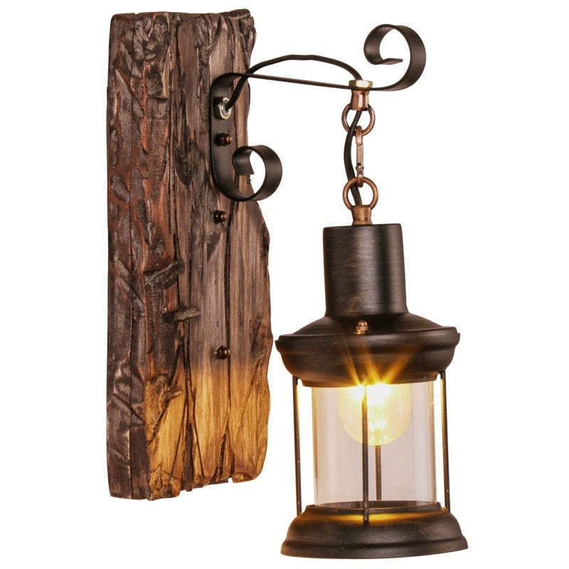 Vintage bronze metal lantern wall lamp. Alessio artistic lighting.