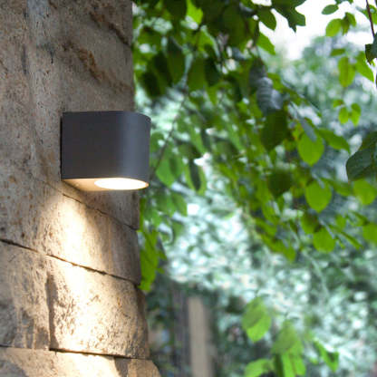 Orr minimalist outdoor wall lamp on stone wall, Las Sola lighting