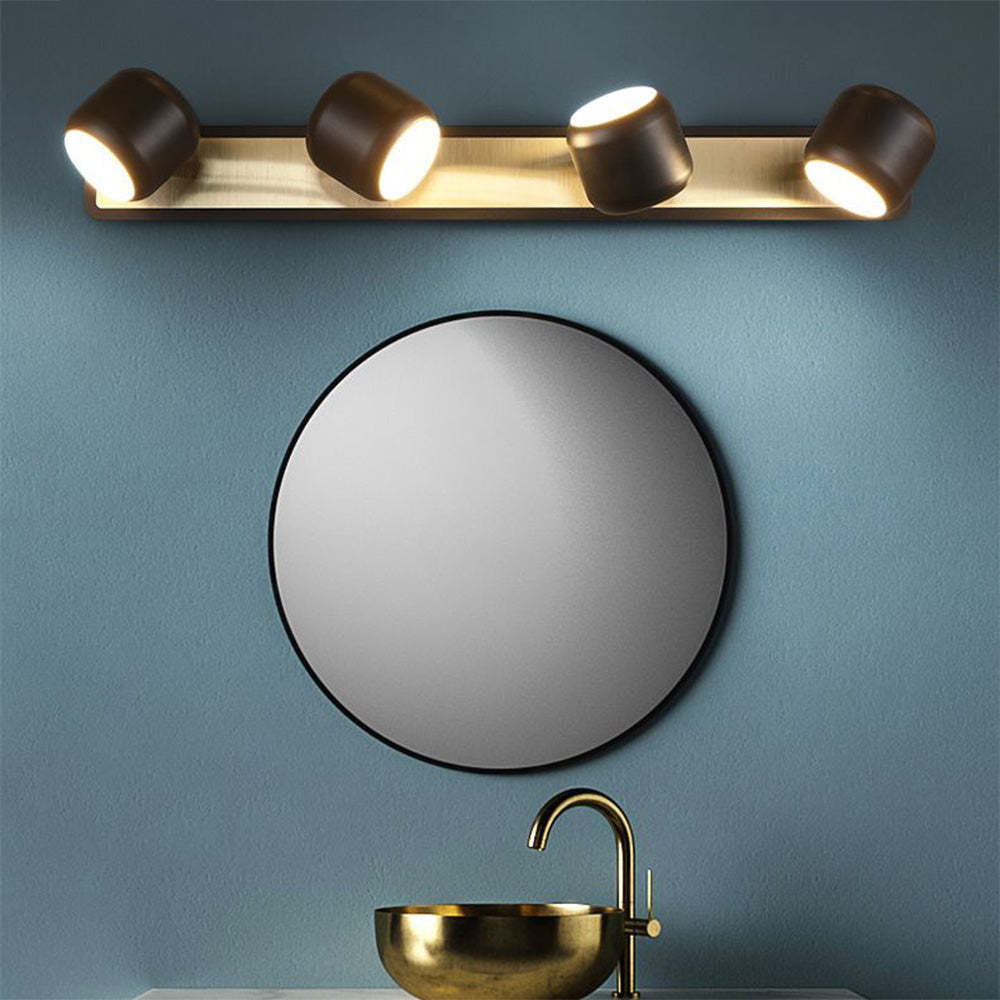 Modern bathroom with Cooley wall lamp and gold fixtures