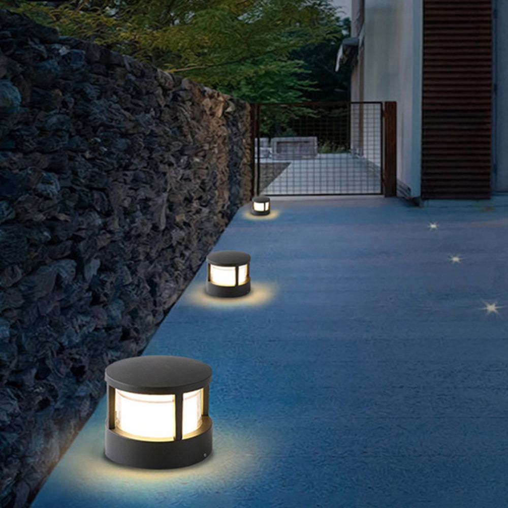 Pena bollard lights illuminating a walkway