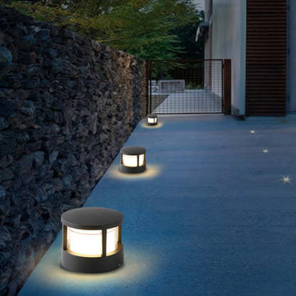 Pena bollard lights illuminating a walkway