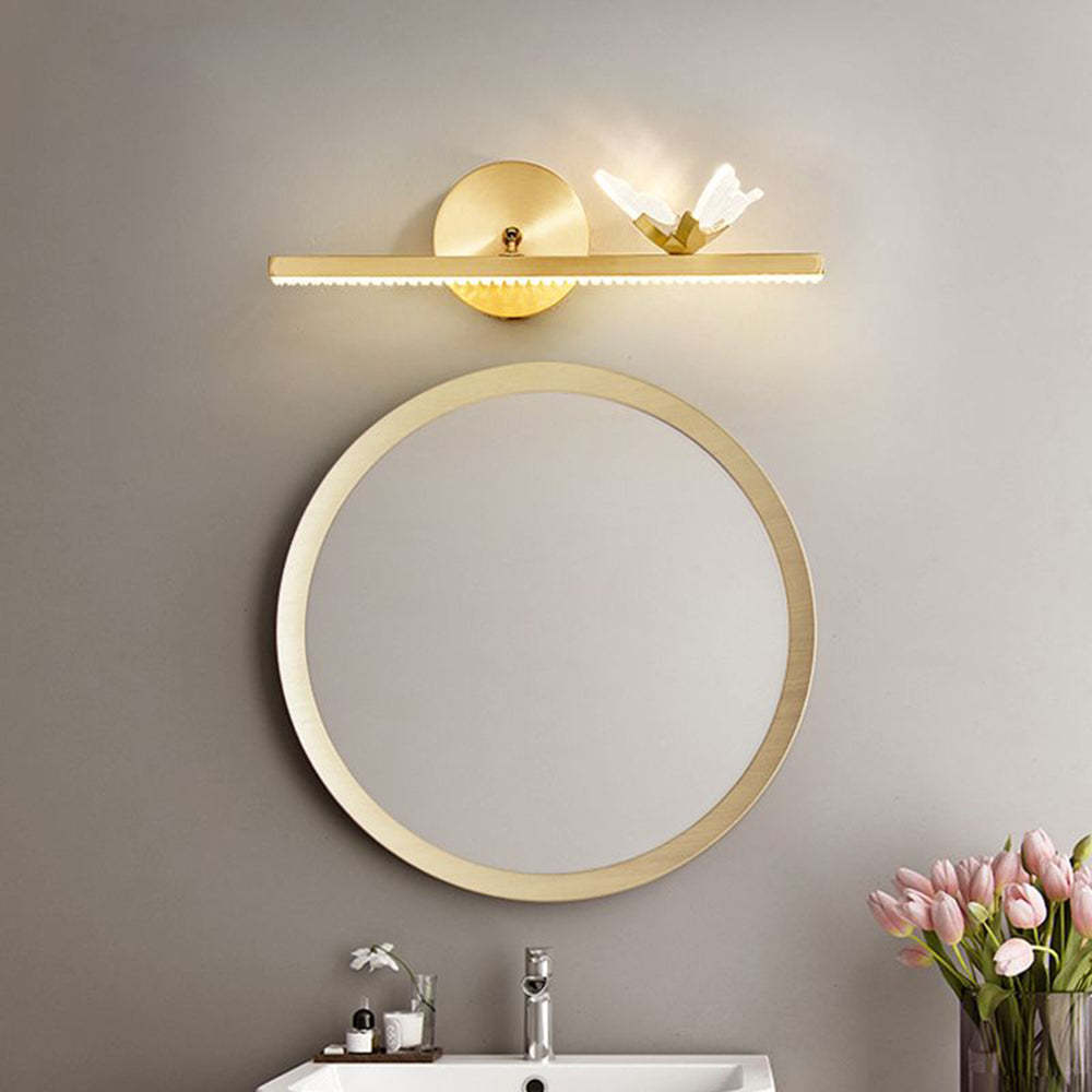 Luxury Kady Butterfly Wall Lamp above a bathroom mirror, gold finish