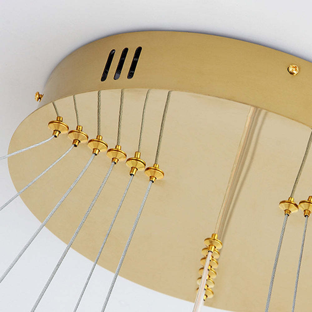 Arisha pendant light gold base detail. Living room lighting fixture.
