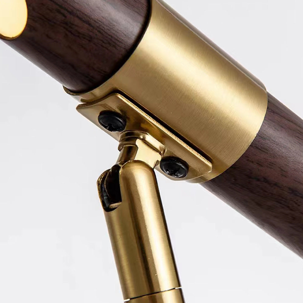 Edge Floor Lamp: gold metal and wood joint detail.