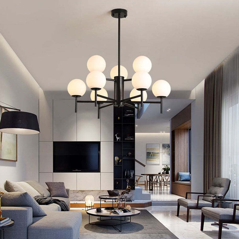 Alessio black globe pendant light in modern living room.