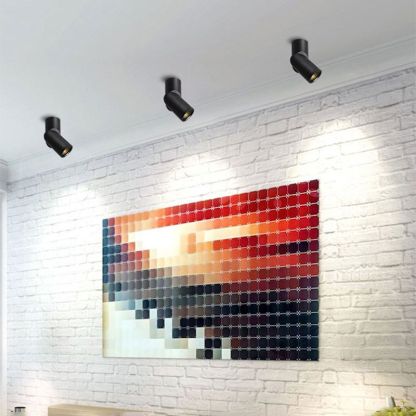 Vovak LED spotlights illuminating artwork in modern interior