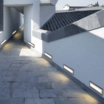 Modern outdoor step lighting on stone path, Orr lights.