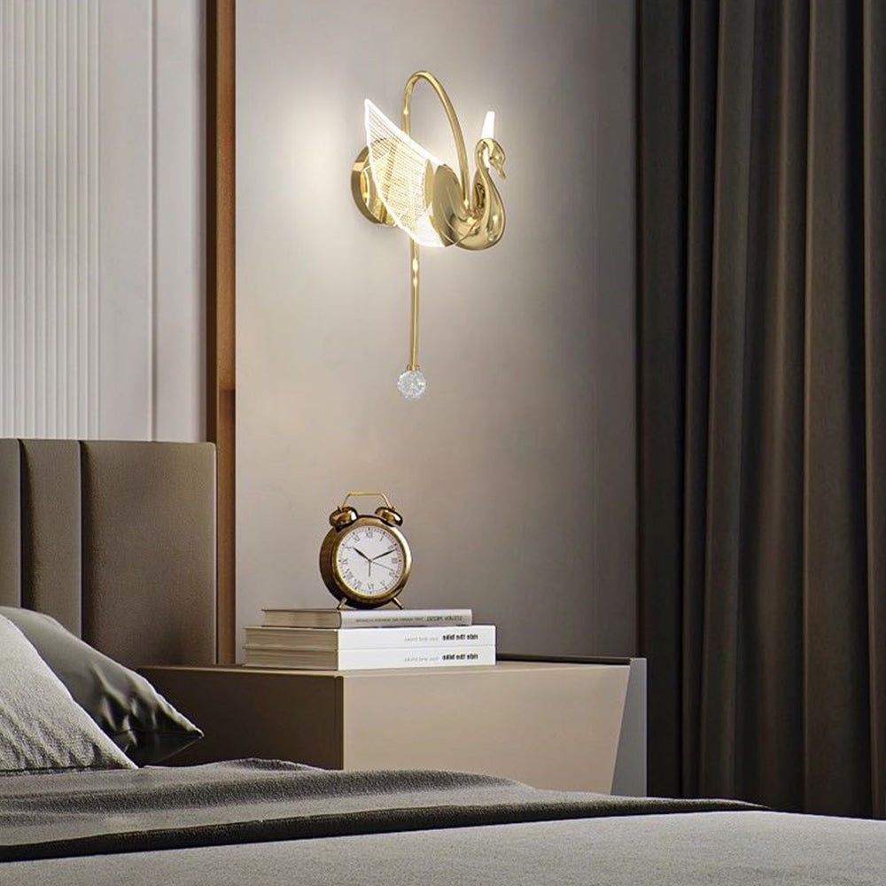 Swan-shaped wall lamp in bedroom setting