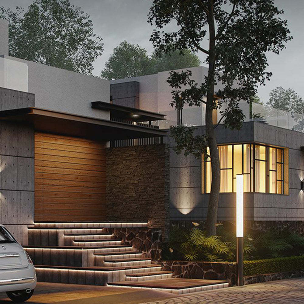 Pena outdoor light illuminating modern house exterior