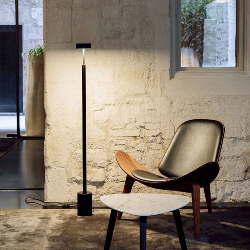 Edge floor lamp by Las Sola, minimalist bedroom decor.