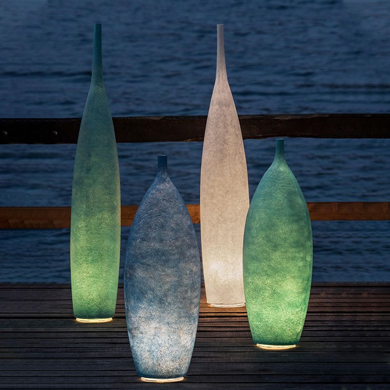 Las Sola: Byers Resin Bottle Floor Lamps on deck