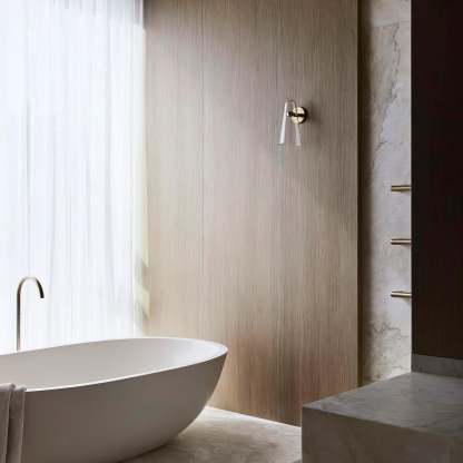 Blair Nordic wall lamp in modern bathroom. Glass & metal wall sconce.
