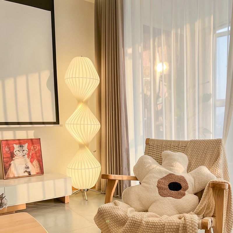 Renee floor lamp in a cozy living room setting.