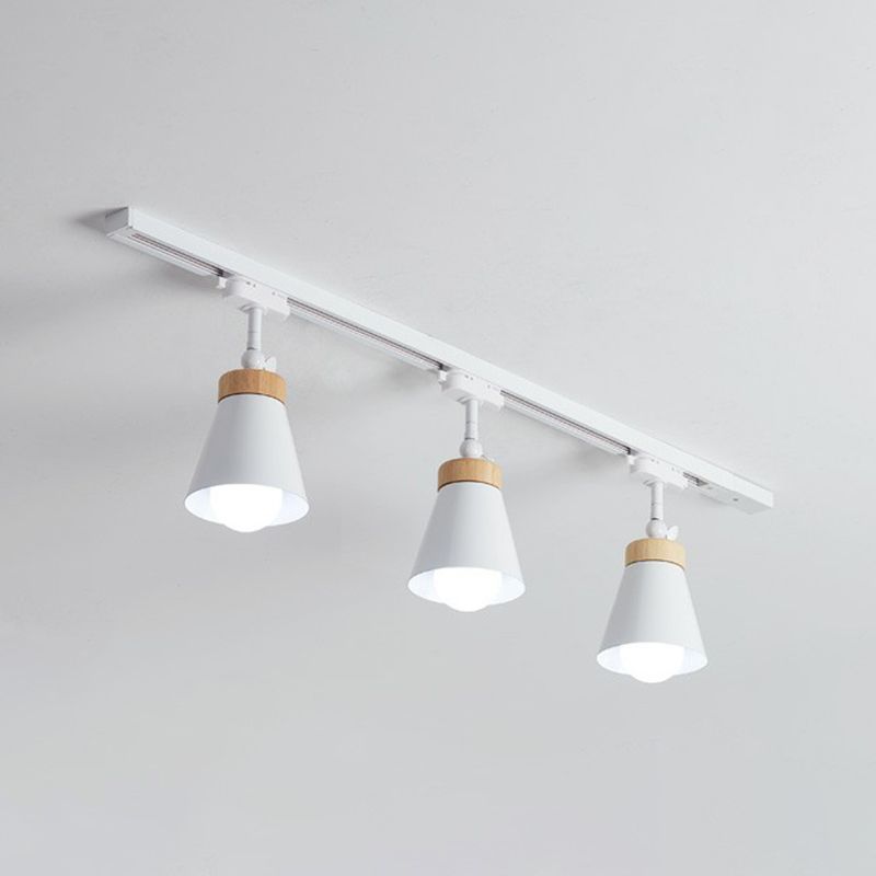 White modern track lighting with wood accents