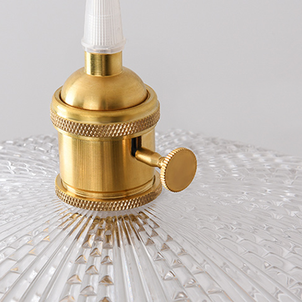 Hailie Art Deco pendant light: brass fitting & textured glass.