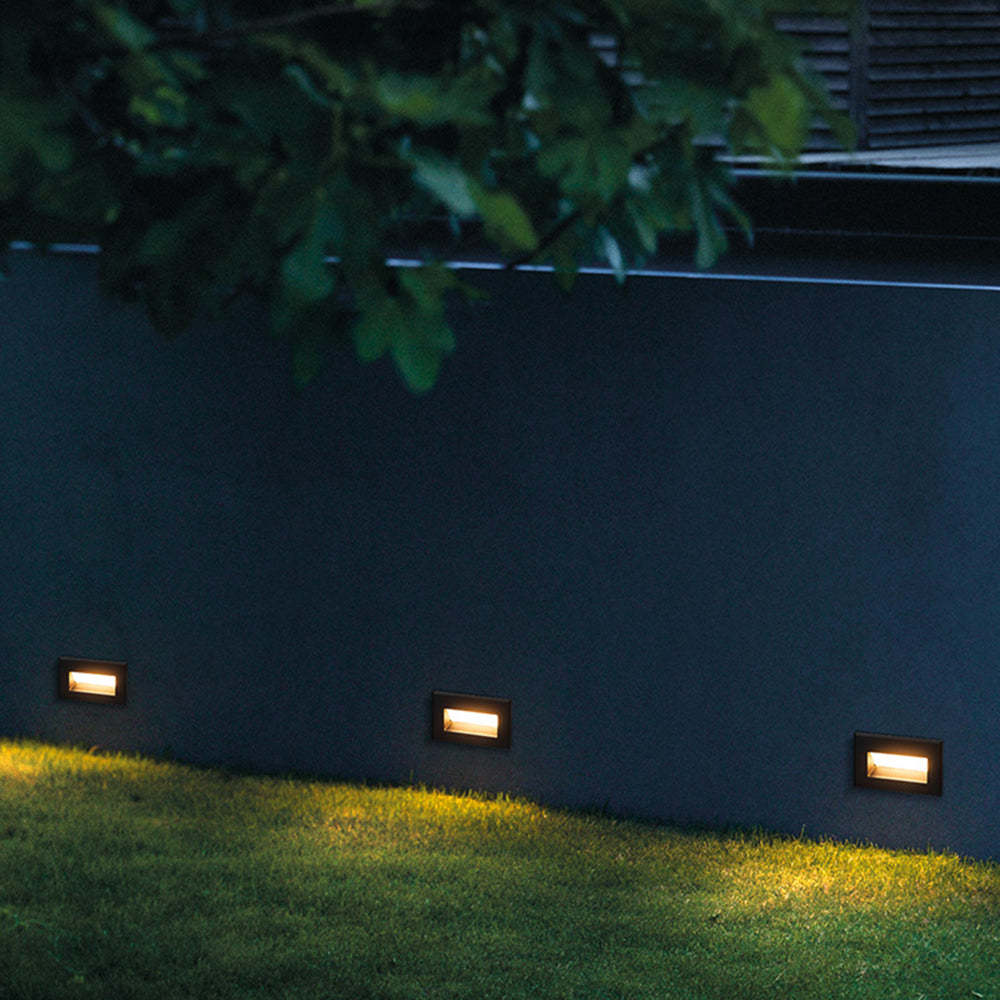 Modern outdoor deck lighting: Orr step lights on wall.