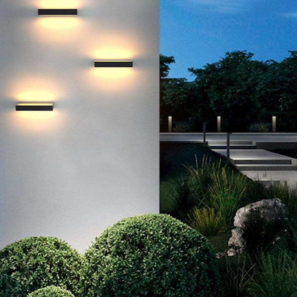 Orr Modern Outdoor Wall Lamp illuminated at night