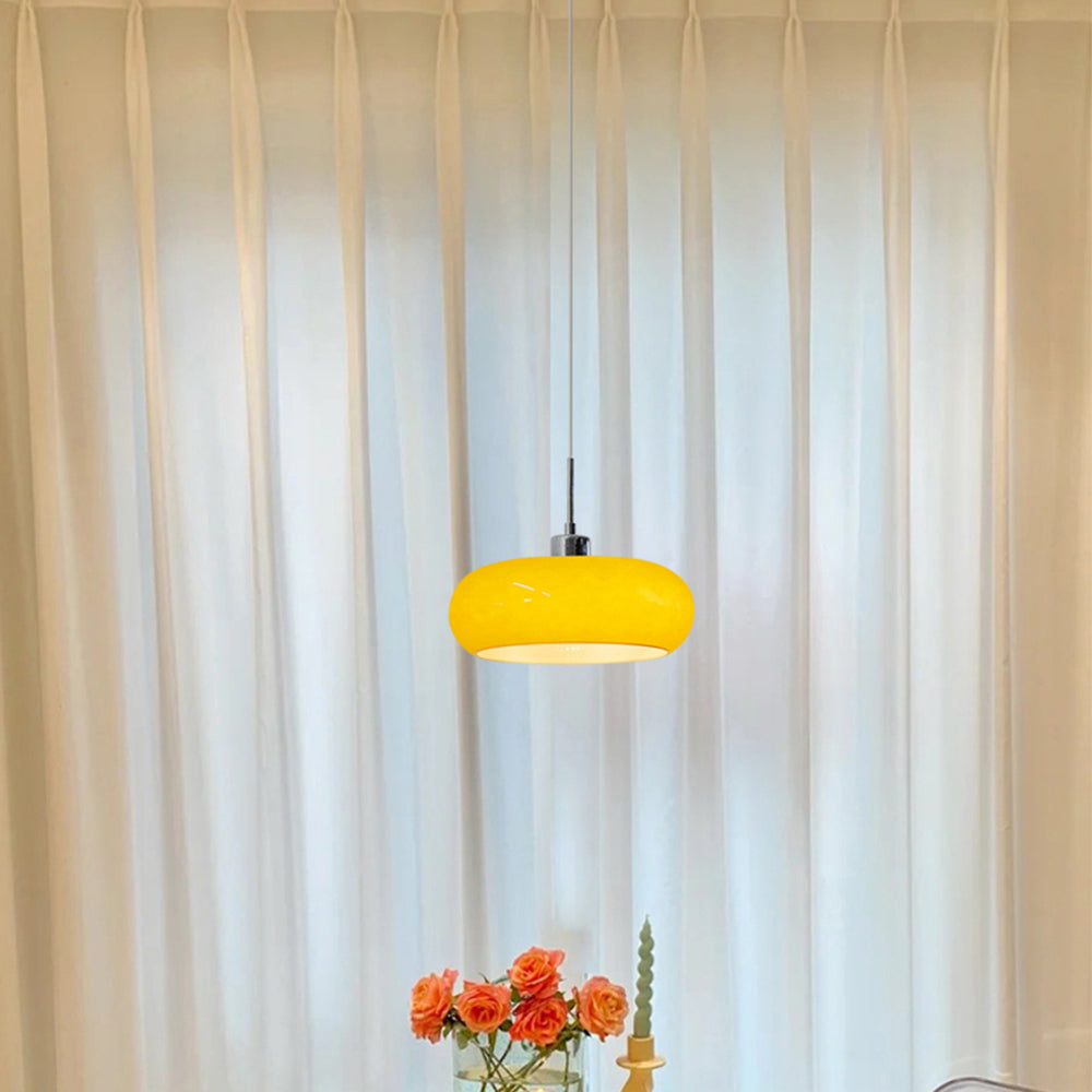 Yellow glass Hailie pendant light in living room. Las Sola lighting.