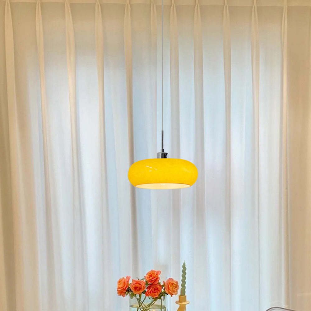 Yellow glass Hailie pendant light in living room. Las Sola lighting.