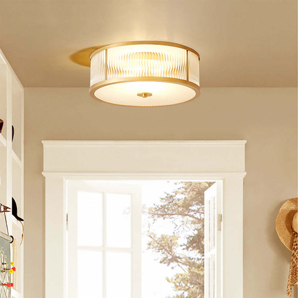 Alessio gold flush mount ceiling light with glass shade