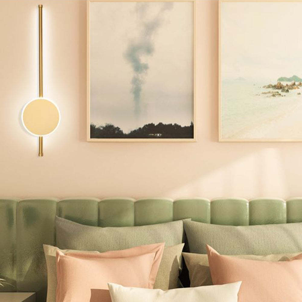 Modern gold wall lamp in bedroom decor