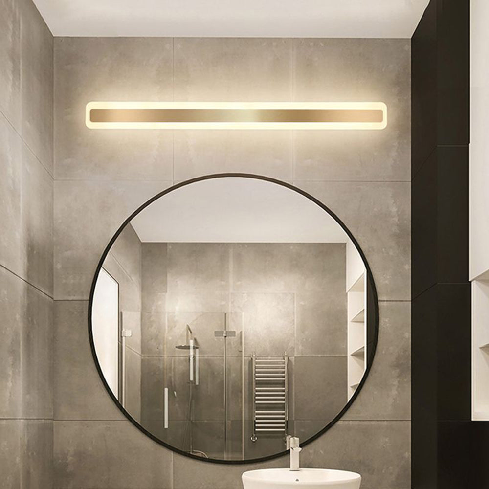 Modern rectangular wall lamp above round vanity mirror