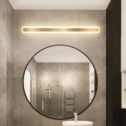 Modern rectangular wall lamp above round vanity mirror