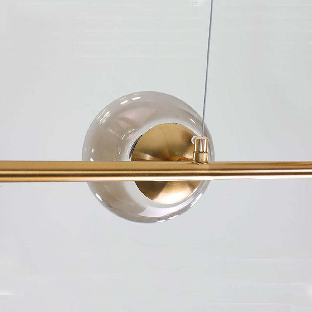 Valentina Pendant Light: Glass Bubble and Metal Detailing