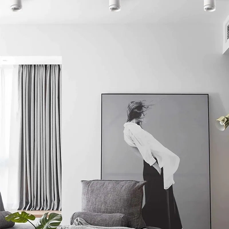 Modern bedroom with Freja ceiling lights and art