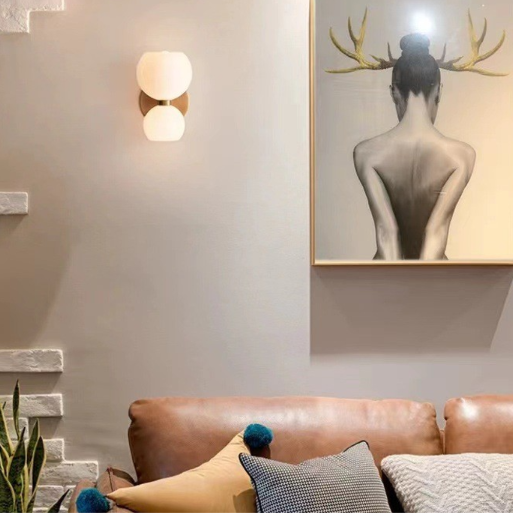 Modern living room with Valentina wall lamp and art
