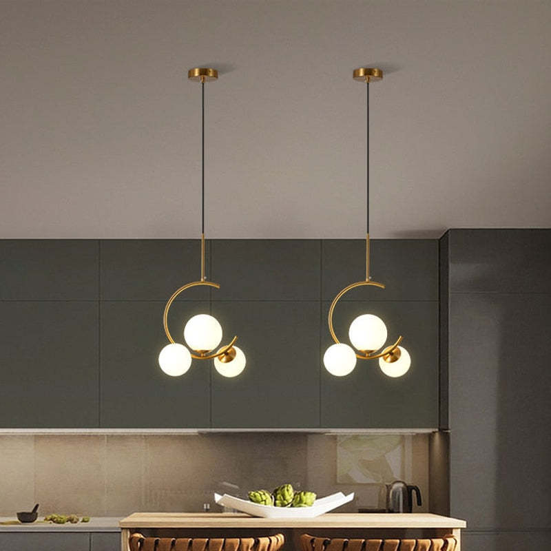Valentina pendant lights above a kitchen island
