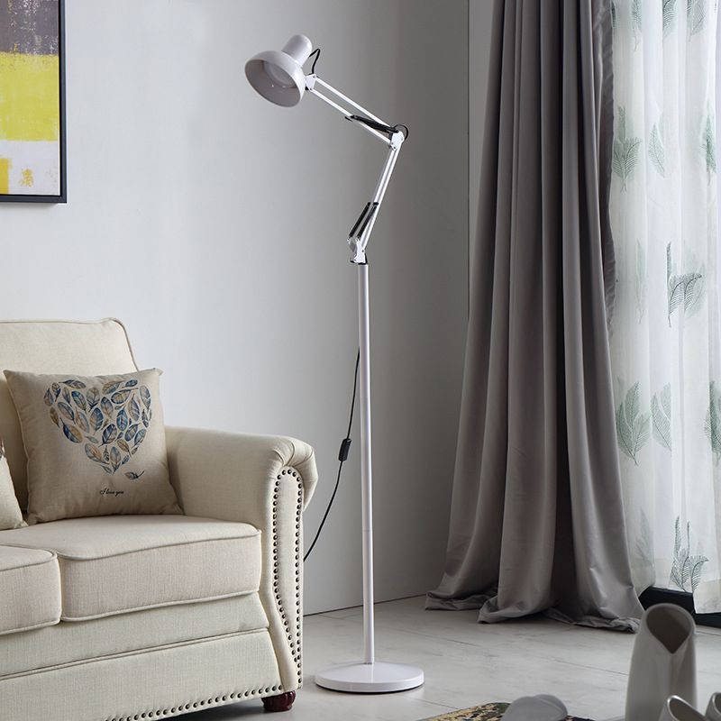 White Morandi floor lamp beside a sofa in living room