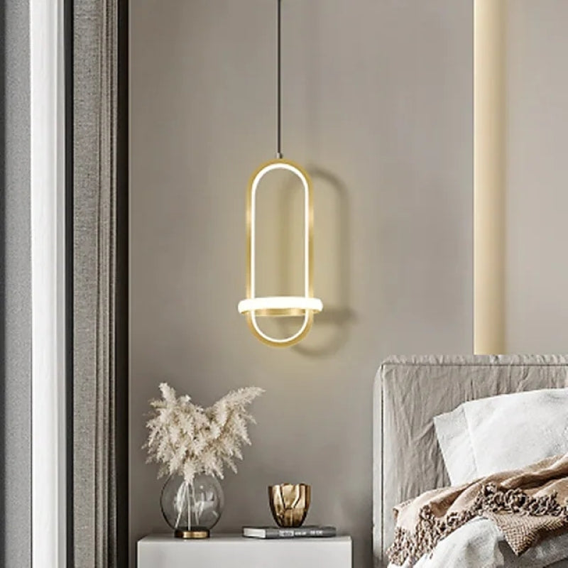 Nyla LED pendant light, gold finish, bedroom interior