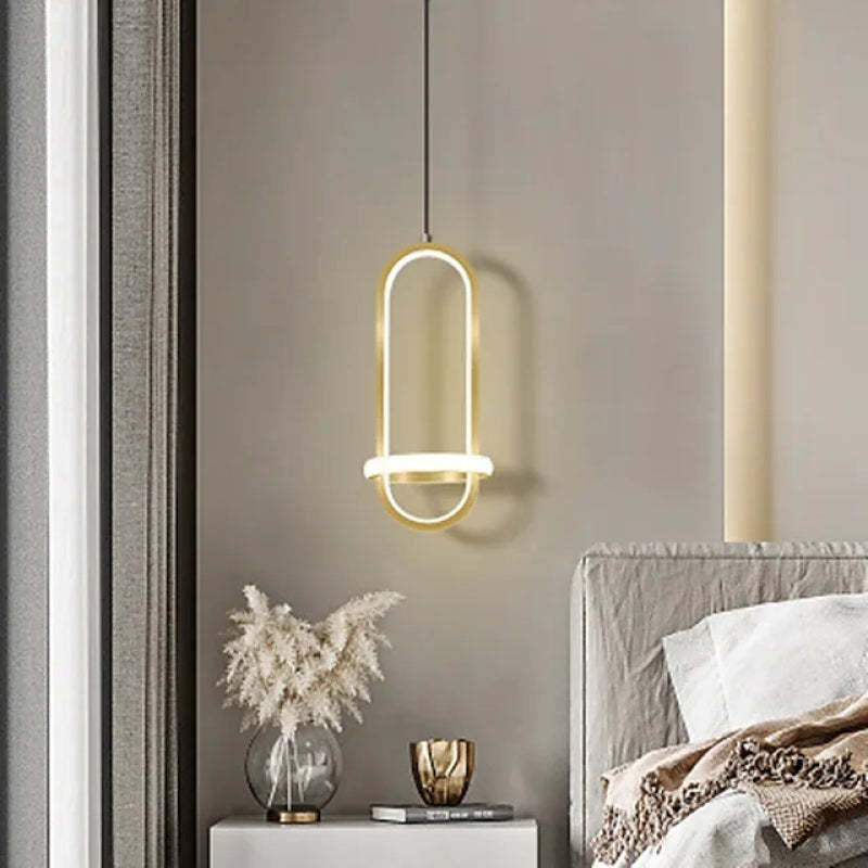 Nyla LED pendant light, gold finish, bedroom interior
