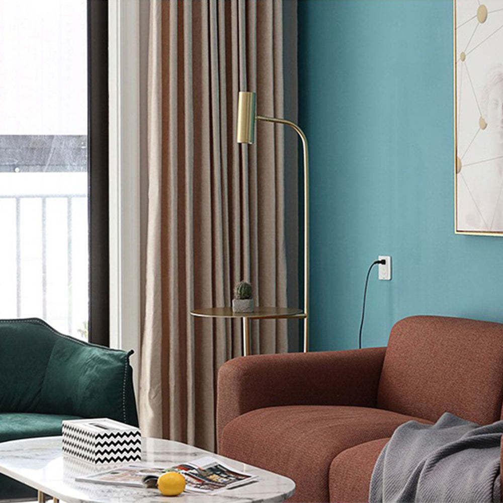 Salgado floor lamp with table in a modern living room setting