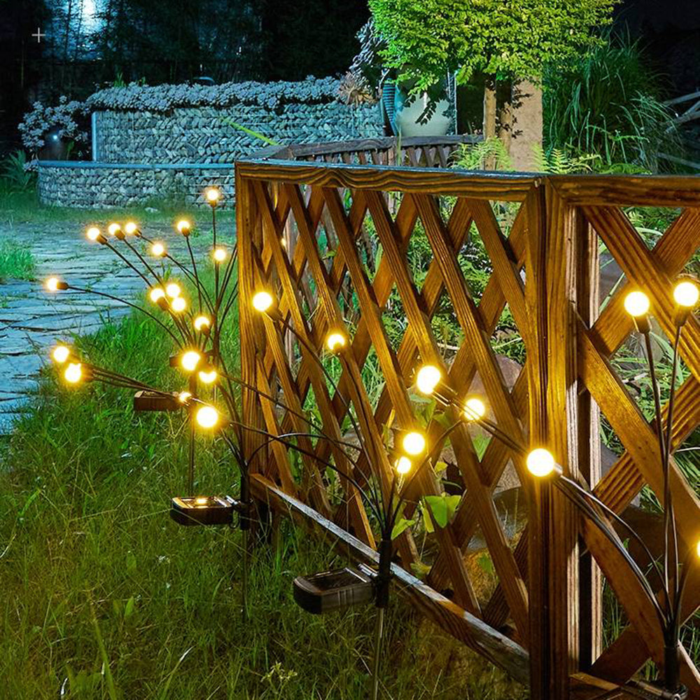 Orr outdoor path light in a garden at night
