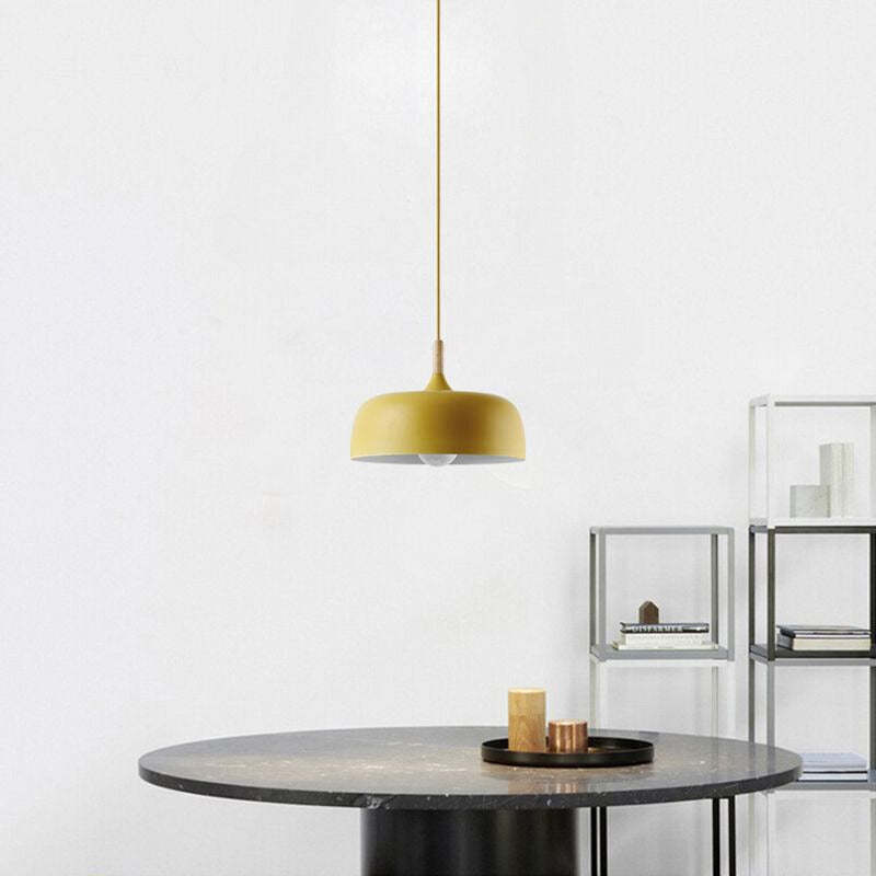 Yellow Leilani pendant light over dining table