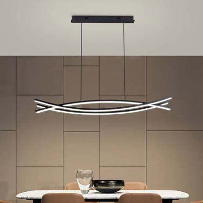 Modern linear pendant light in dining room setting.